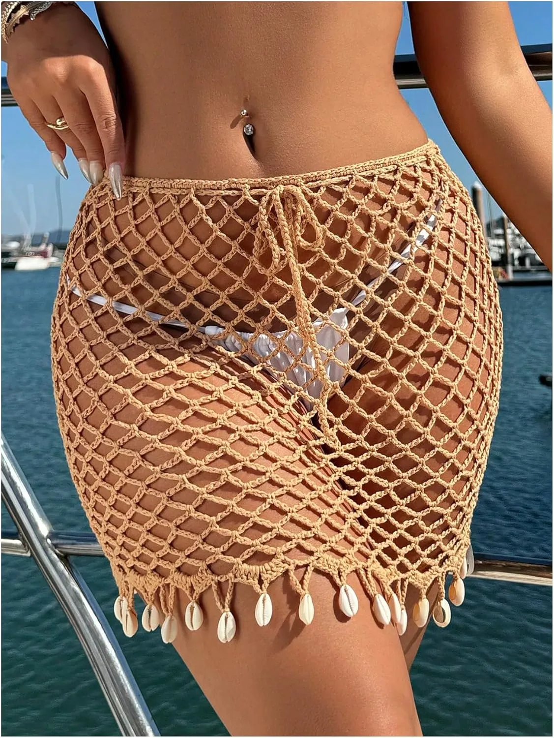 MakeMeChic Women's Crochet Mini Skirt Hollow Out Beach Cover Up Fringe Short Skirt